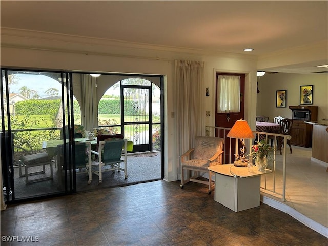 entryway with crown molding