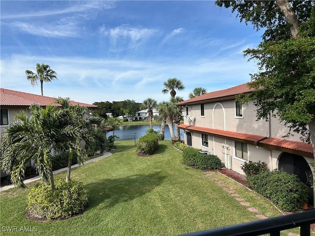 view of yard with a water view