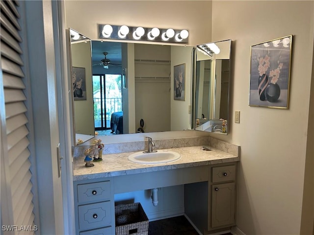 bathroom with vanity and ceiling fan