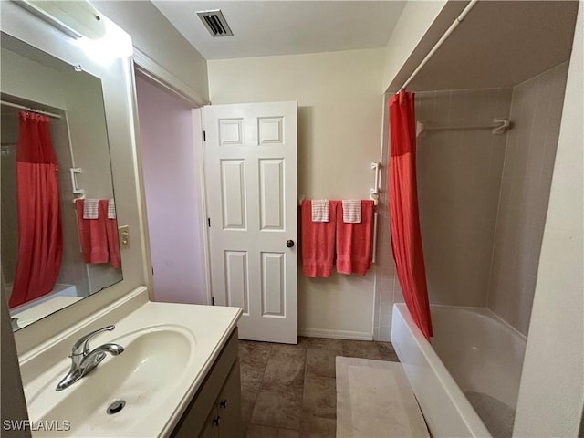 bathroom with vanity and shower / bath combo