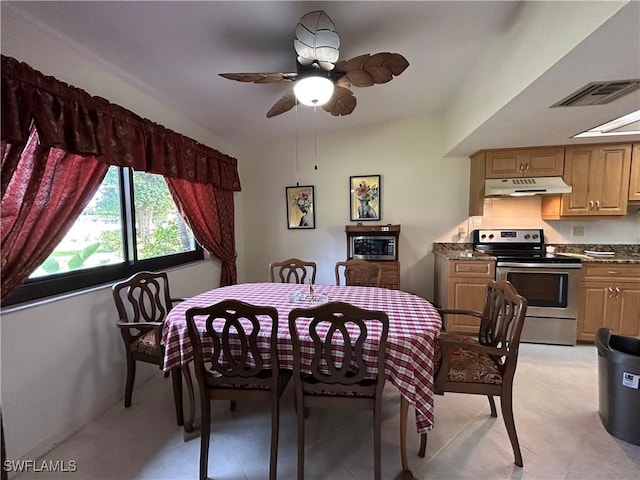 dining area with ceiling fan