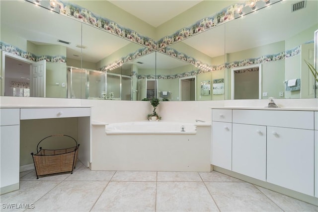 bathroom with tile patterned floors, vanity, and independent shower and bath