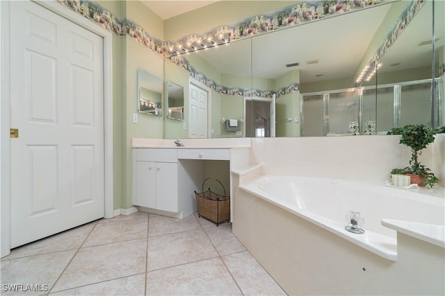 bathroom featuring vanity, shower with separate bathtub, and tile patterned flooring