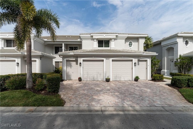 view of front of property with a garage