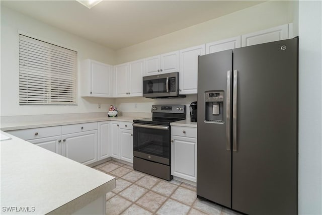 kitchen featuring white cabinets and stainless steel appliances