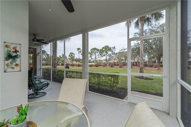8461 Southbridge Dr Unit 4, Estero, FL 33967 - unfurnished sunroom featuring ceiling fan