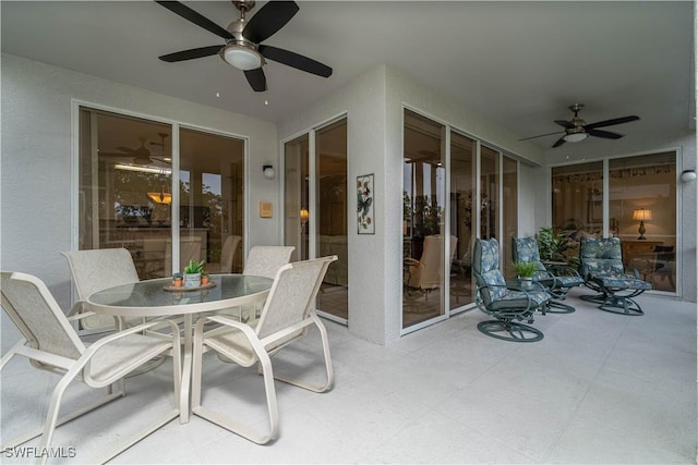 view of patio / terrace featuring ceiling fan