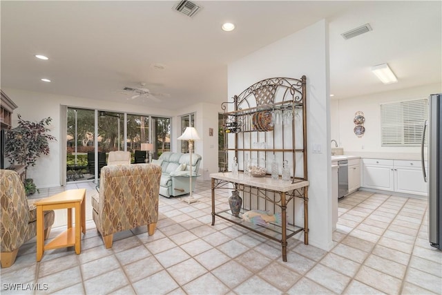 living room with ceiling fan