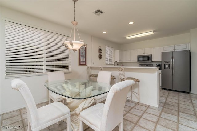 dining room with sink