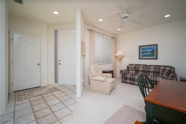 living room featuring ceiling fan