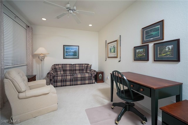 office space featuring carpet floors and ceiling fan