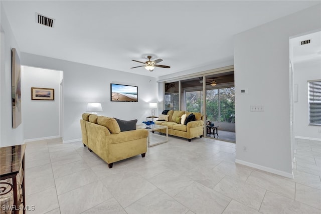 living room with ceiling fan