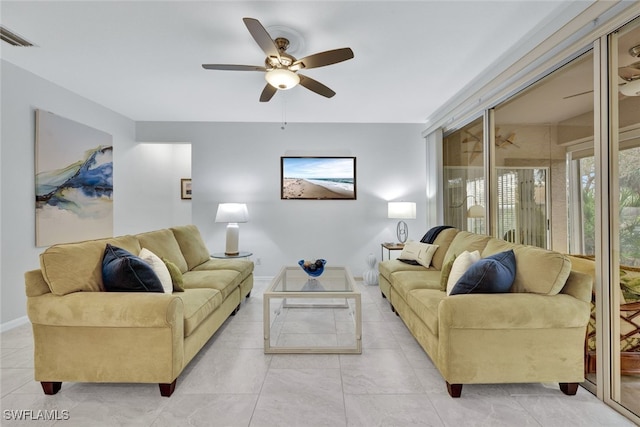 living room featuring ceiling fan