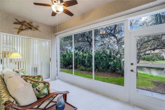 sunroom / solarium with ceiling fan