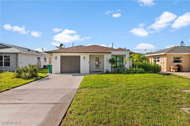 ranch-style home with a garage and a front yard