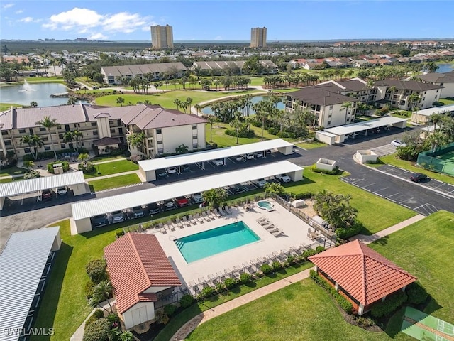 drone / aerial view with a water view