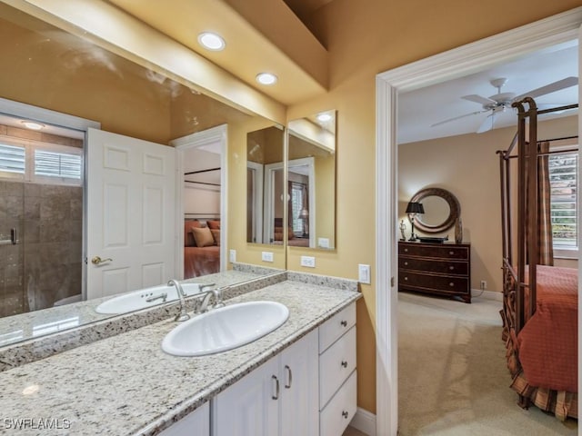 bathroom featuring vanity and ceiling fan