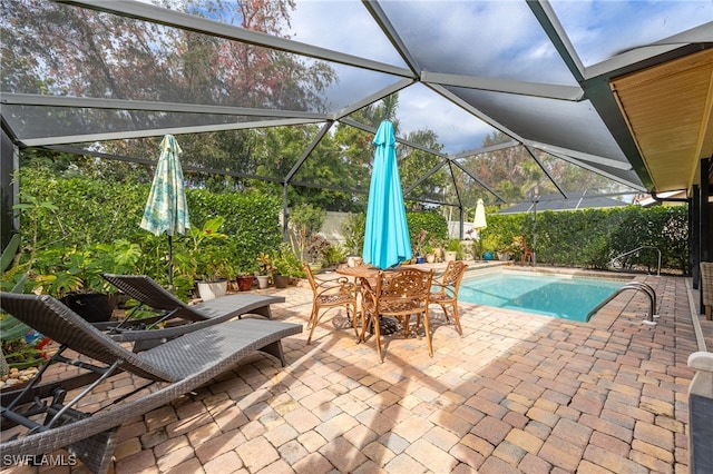 view of pool featuring a lanai and a patio area