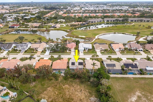 bird's eye view with a water view