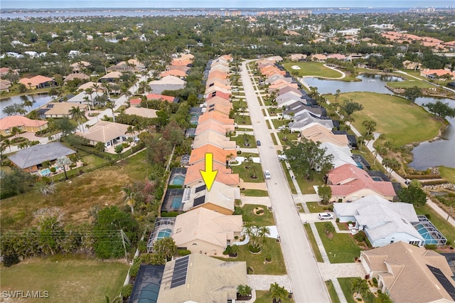 drone / aerial view with a water view