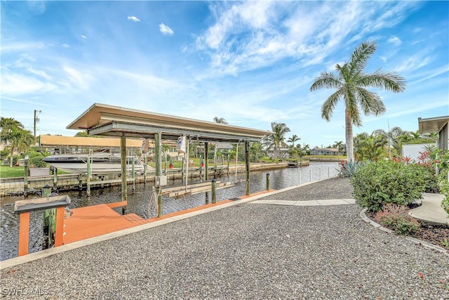 view of dock with a water view