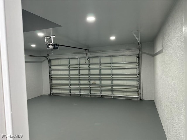 garage featuring a garage door opener