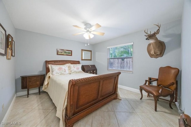 bedroom featuring light tile patterned floors and ceiling fan