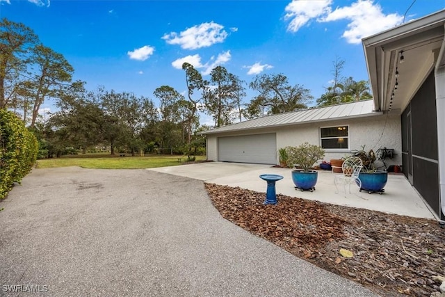 exterior space with a garage