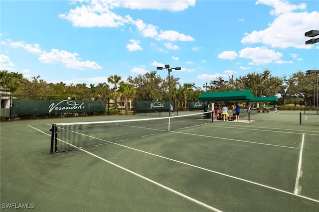 view of sport court featuring community basketball court and fence