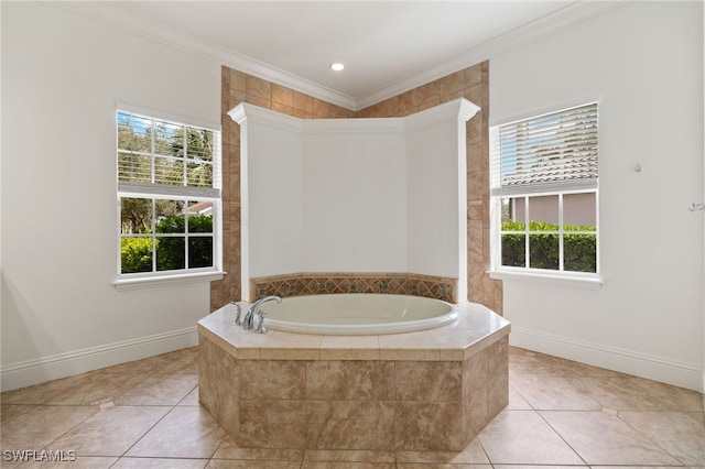 bathroom with a relaxing tiled tub, crown molding, and tile patterned flooring