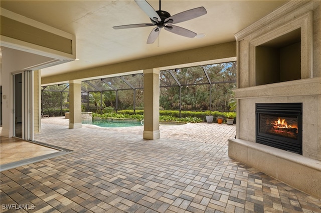 view of patio with exterior fireplace