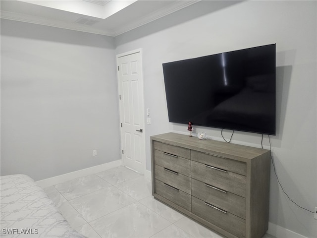 bedroom featuring crown molding