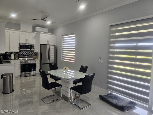 dining room with ornamental molding, a wall mounted AC, and sink