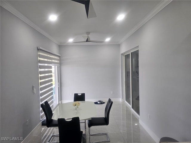 dining room featuring ceiling fan and ornamental molding