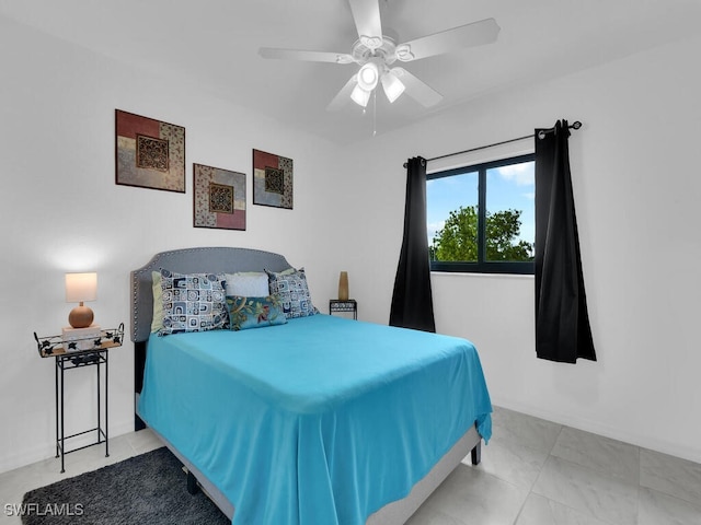 bedroom with light tile patterned floors and ceiling fan