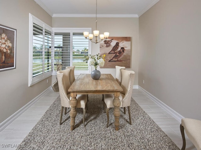 dining room featuring a notable chandelier and ornamental molding