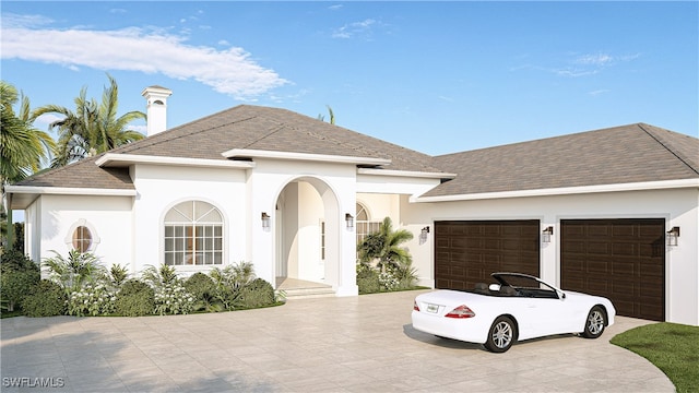 view of front of home featuring a garage