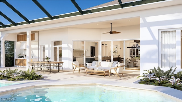 view of pool with ceiling fan, outdoor lounge area, and a patio