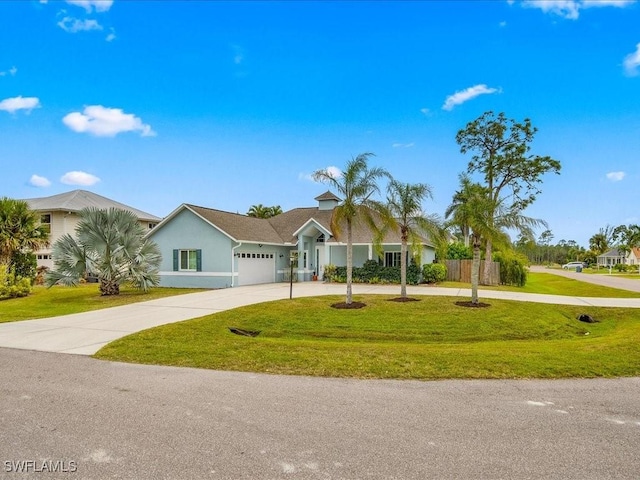 ranch-style home featuring a front yard and a garage