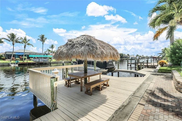 view of dock with a water view