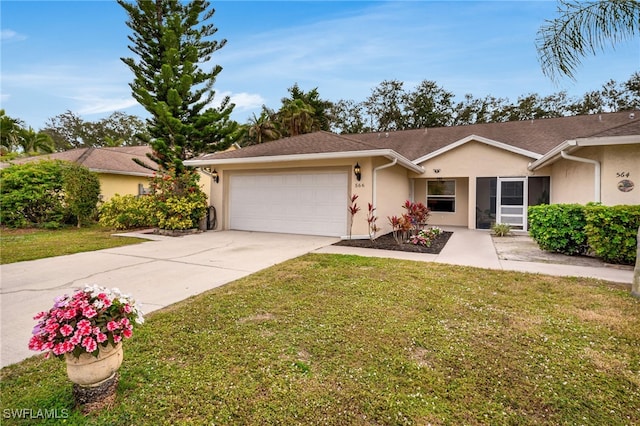 ranch-style house featuring a garage and a front lawn