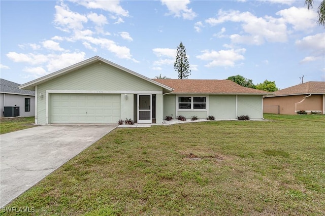 ranch-style house with a garage, cooling unit, and a front lawn