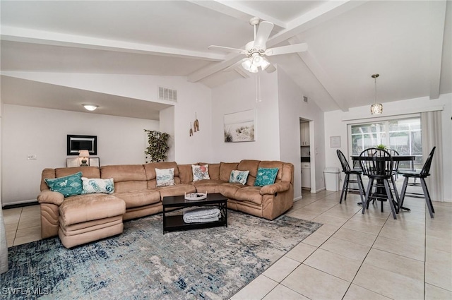 tiled living room featuring ceiling fan and lofted ceiling with beams