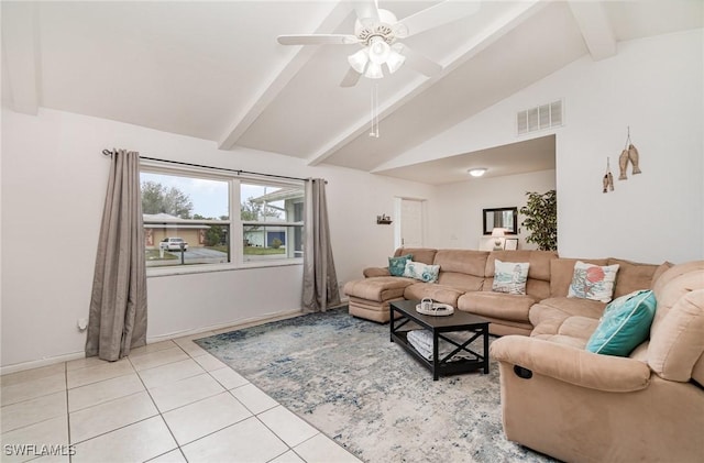 living room featuring vaulted ceiling with beams, light tile patterned floors, and ceiling fan