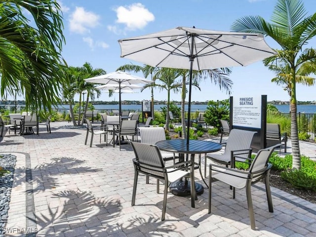 view of patio featuring a water view