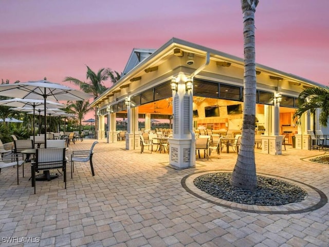 patio terrace at dusk with exterior bar