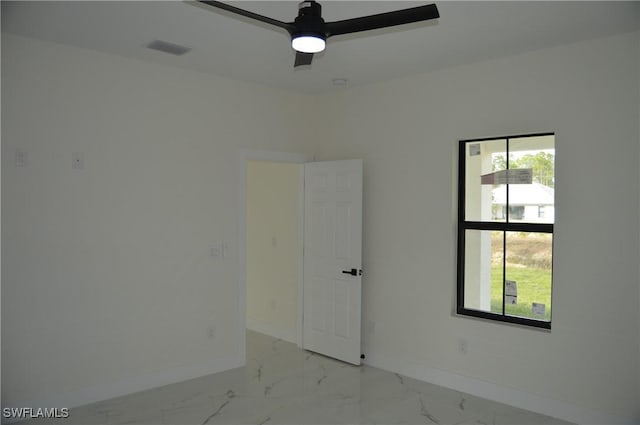 empty room featuring ceiling fan