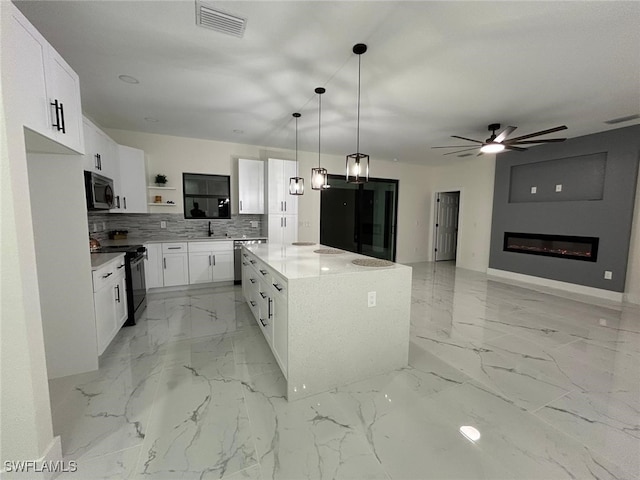 kitchen with black appliances, visible vents, marble finish floor, and open shelves