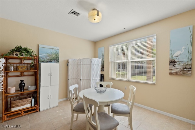 view of tiled dining space