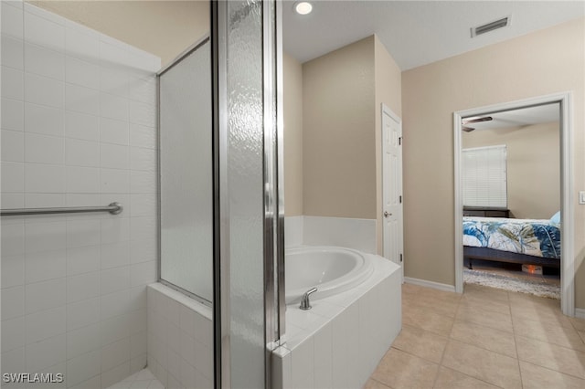 bathroom with tile patterned flooring and plus walk in shower